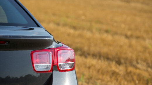 A rearview of a parked car.