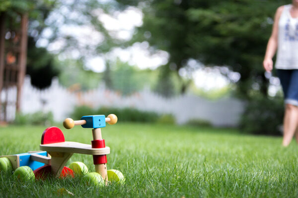 Children’s toy on a green grass lawn.