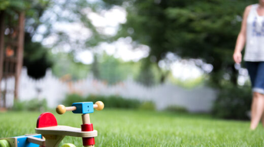 Children’s toy on a green grass lawn.