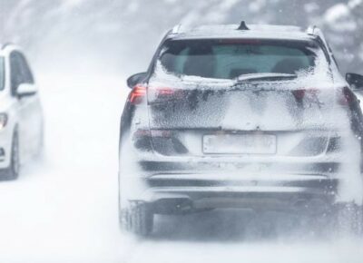 SUV on snow-covered road.